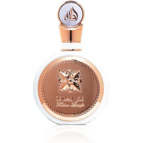 bottiglia di profumo dorata e bianca